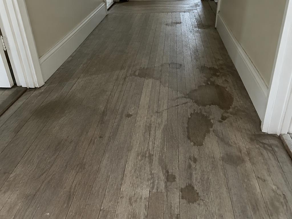 Worn floor restored before refinishing